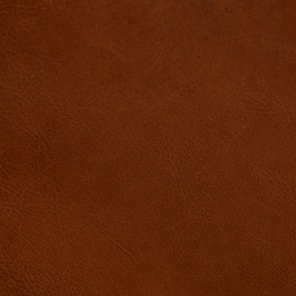 Nino Ottoman by Four Hands in dakota tobacco. Made from top grain leather, solid nettlewood, 100% polyester in a modern style.