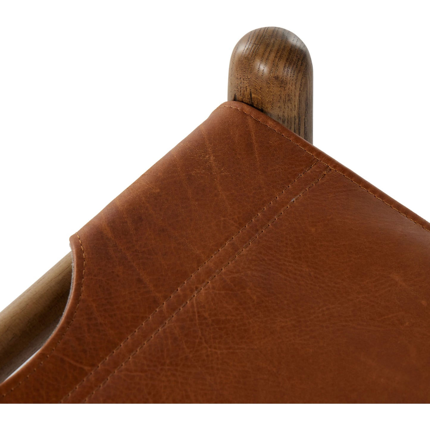 007 SI-2001738 | Closeup | Nino Ottoman by Four Hands in dakota tobacco. Made from top grain leather, solid nettlewood, 100% polyester in a modern style.