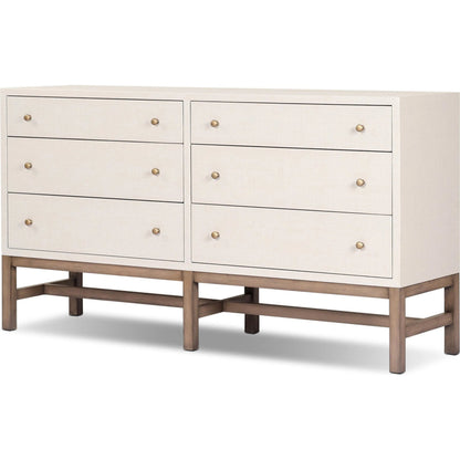 Fiona 6 Drawer Dresser by Four Hands in ivory painted raffia, russet mahogany, light antique brass. Made from sugar palm, solid mahogany, steel in a transitional style.
