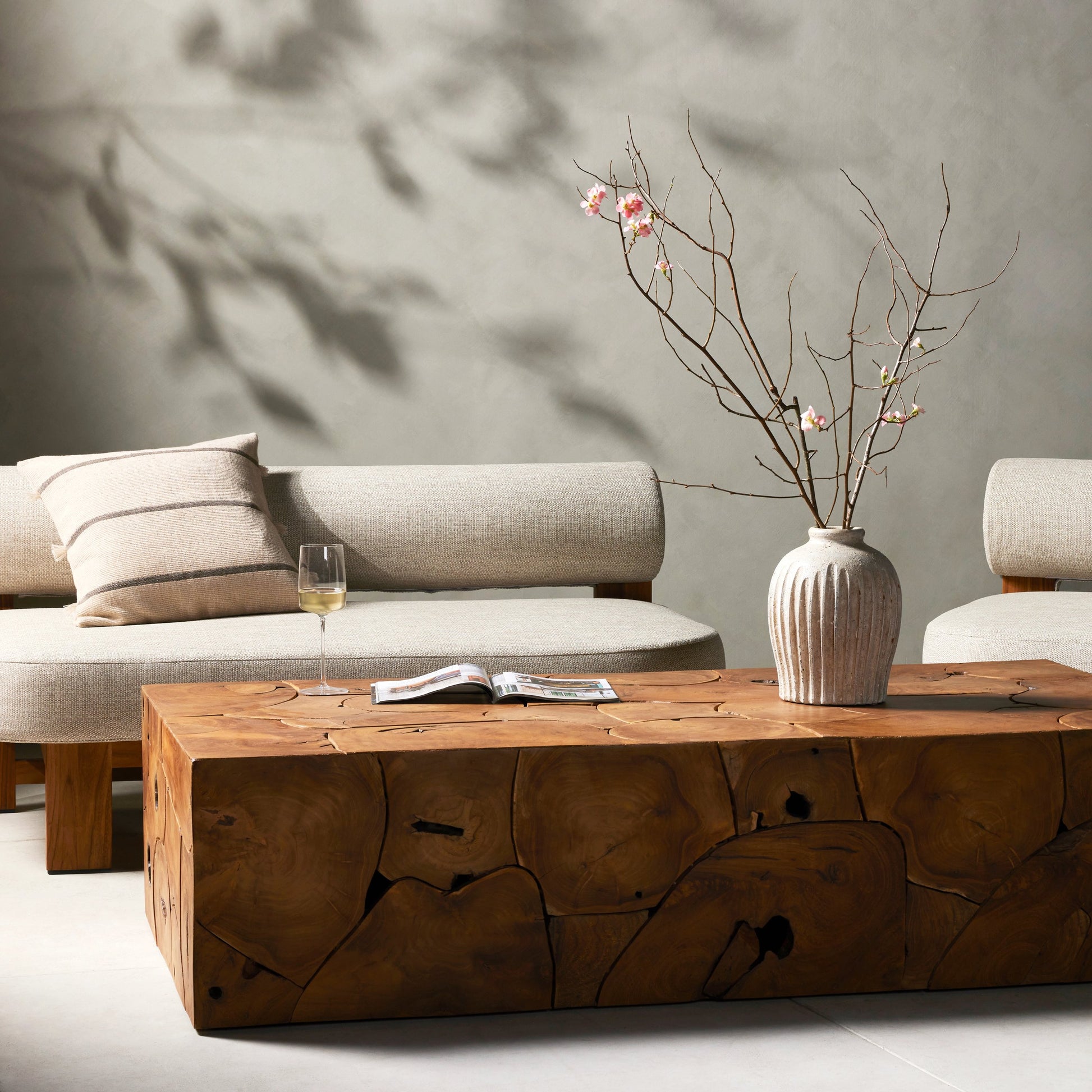 Tomlin Outdoor Coffee Table by Four Hands in teak root. Made from solid teak in a modern style.