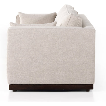 Lawrence Sofa by Four Hands in nova taupe, dark auburn. Made from 100% polyester, solid rosa morada, pine plywood in a transitional style.
