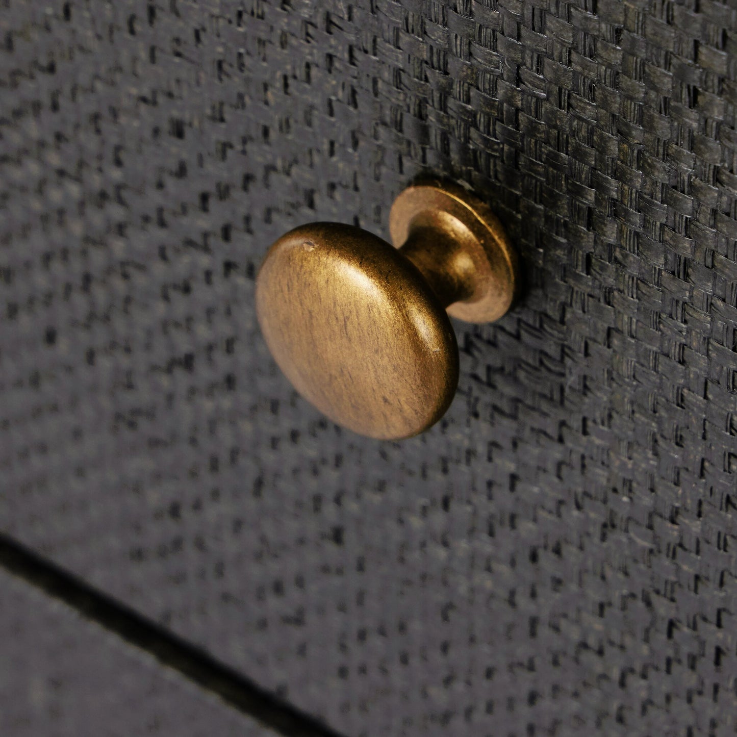 009 SI-2001312 | Closeup | Fiona Nightstand by Four Hands in black raffia, russet mahogany, light antique brass. Made from sugar palm, solid mahogany, iron in a modern style.