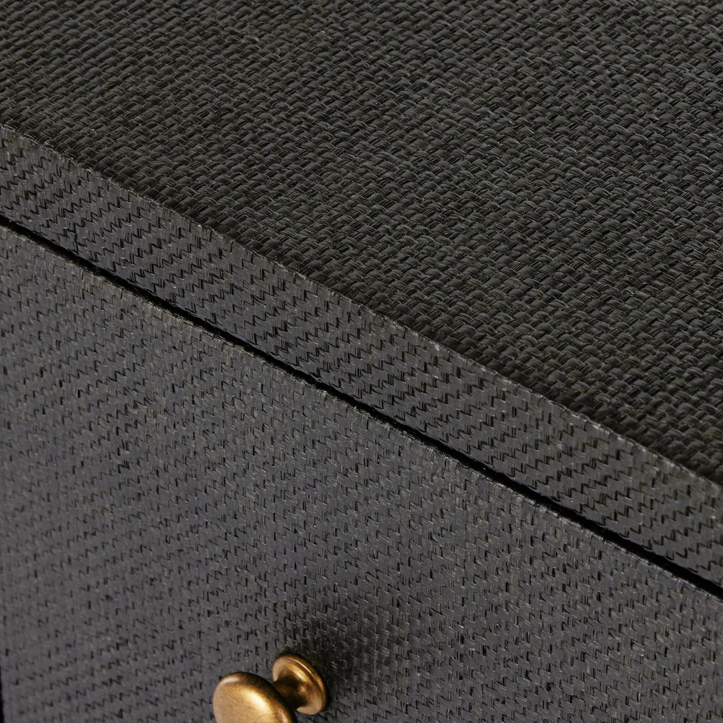 012 SI-2001312 | Closeup | Fiona Nightstand by Four Hands in black raffia, russet mahogany, light antique brass. Made from sugar palm, solid mahogany, iron in a modern style.