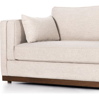 Lawrence Sofa by Four Hands in nova taupe, dark auburn. Made from 100% polyester, solid rosa morada, pine plywood in a transitional style.