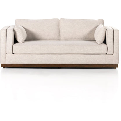 Lawrence Sofa by Four Hands in nova taupe, dark auburn. Made from 100% polyester, solid rosa morada, pine plywood in a transitional style.