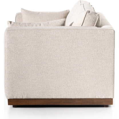 Lawrence Sofa by Four Hands in nova taupe, dark auburn. Made from 100% polyester, solid rosa morada, pine plywood in a transitional style.