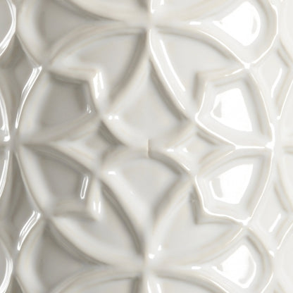 Cornelia Lamp by Wildwood in snow white glaze, antique silver leaf. Made from ceramic, porcelain in a transitional style.