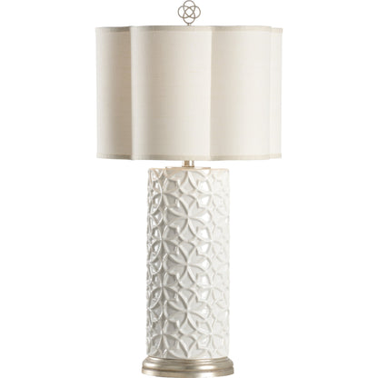 Cornelia Lamp by Wildwood in snow white glaze, antique silver leaf. Made from ceramic, porcelain in a transitional style.