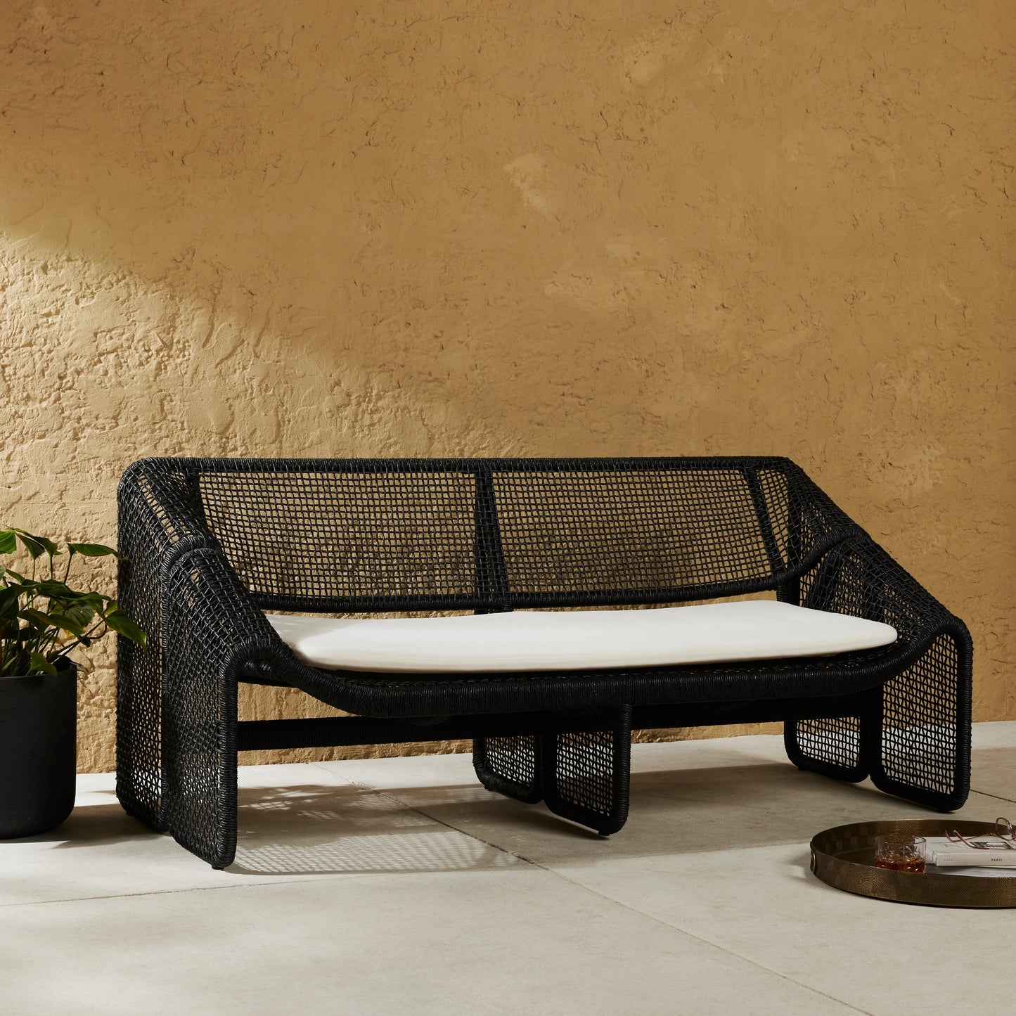 003 SI-1977781 | Lifestyle | Selma Outdoor Sofa by Four Hands in venao ivory. Made from 100% olefin, 100% polyethylene, 91% polyurethane foam pad, 9% polyester fiber batting in a modern style.