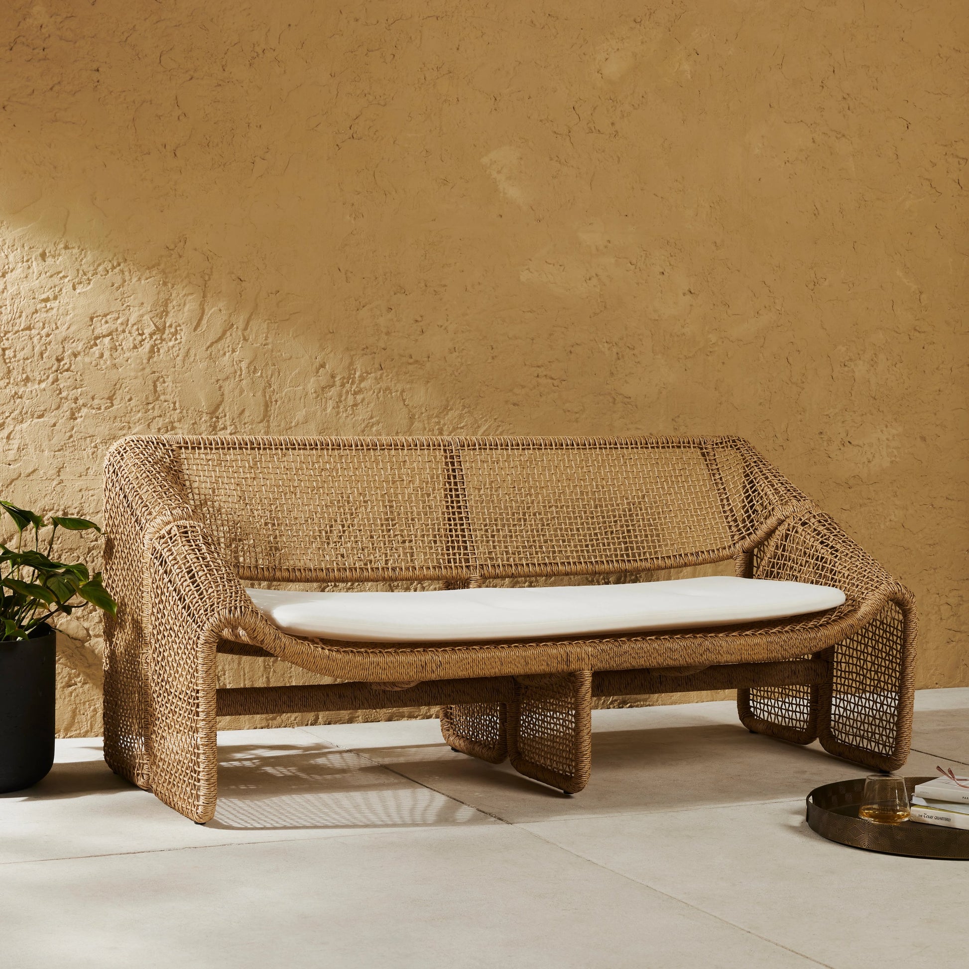 Selma Outdoor Sofa by Four Hands in venao ivory. Made from 100% olefin, 100% polyethylene, 91% polyurethane foam pad, 9% polyester fiber batting in a modern style.