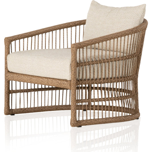 Montecito Outdoor Chair by Four Hands in faye sand, faux dark hyacinth. Made from 100% olefin, 100% polyethylene, 59% polyurethane foam, 30% polyester fiber, 11% polyester fiber batting in a modern style.