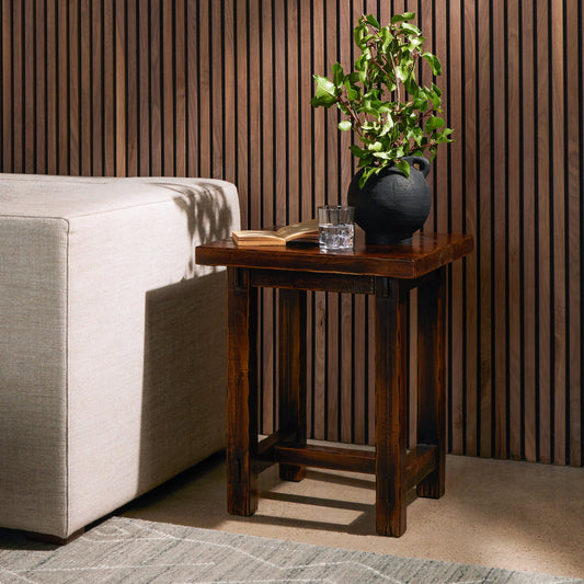 Rinda End Table by Four Hands in distressed walnut. Made from solid birch in a modern style.