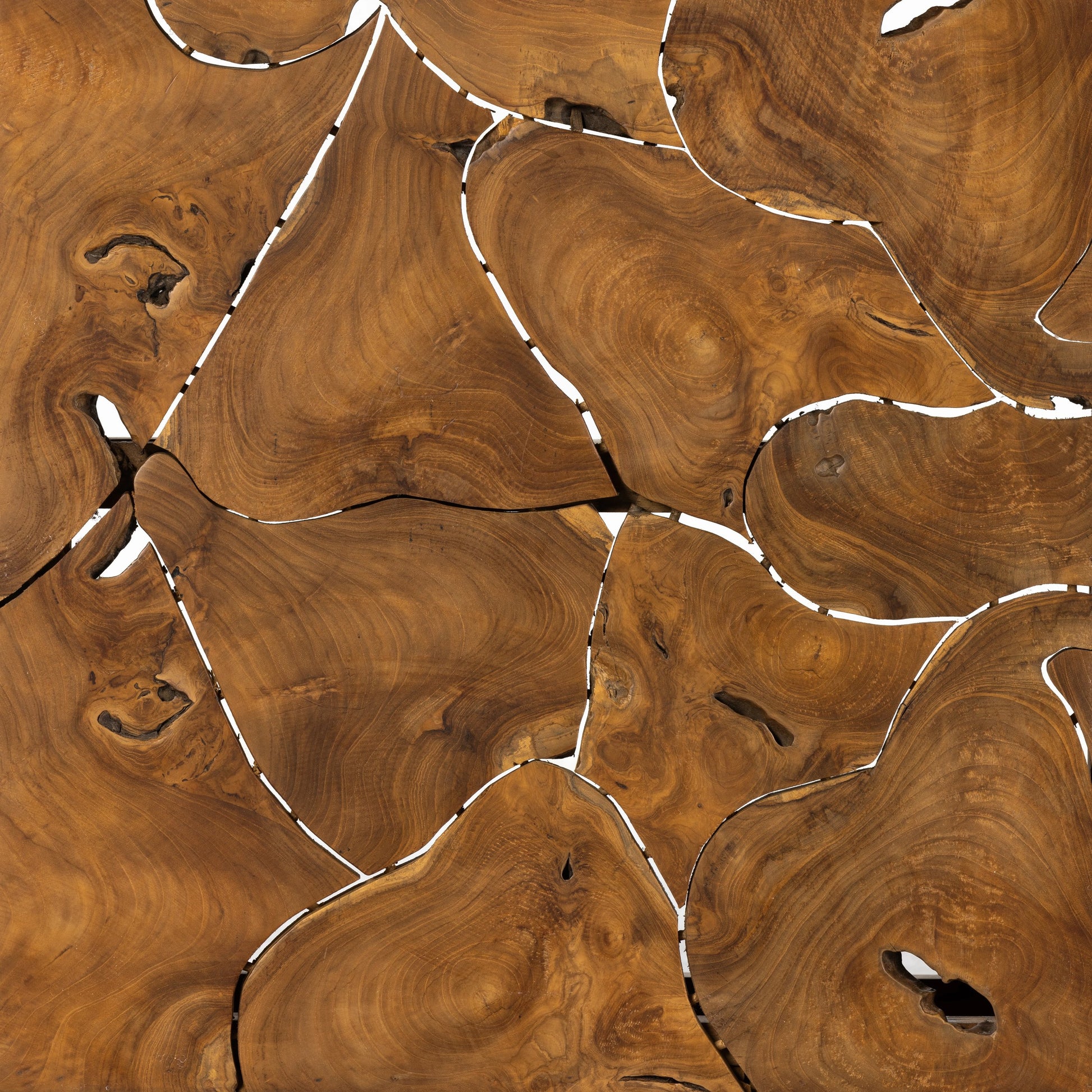 Tomlin Outdoor Bunching Table by Four Hands in teak root. Made from solid teak in a modern style.