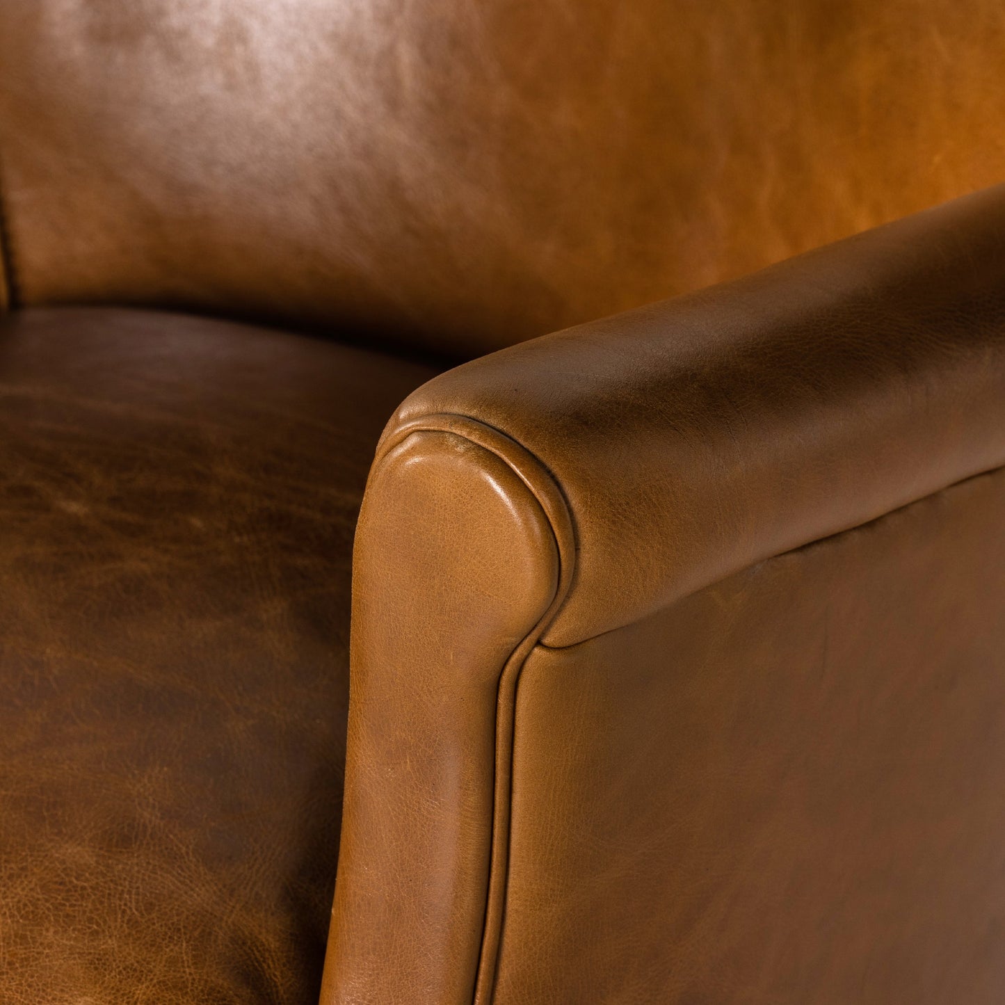 015 SI-1901568 | Closeup | Wycliffe Chair by Four Hands in vintage soft camel, weathered ash. Made from top grain leather, solid ash, 100% polyester in a modern style.