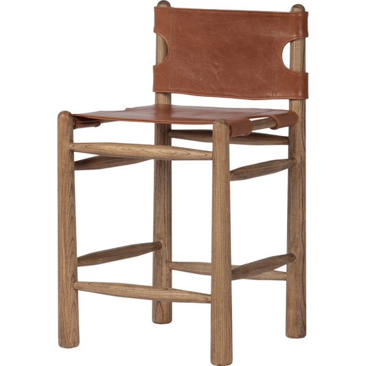 Nino Counter Stool by Four Hands in dakota tobacco. Made from top grain leather, solid nettlewood, 100% polyester in a modern style.