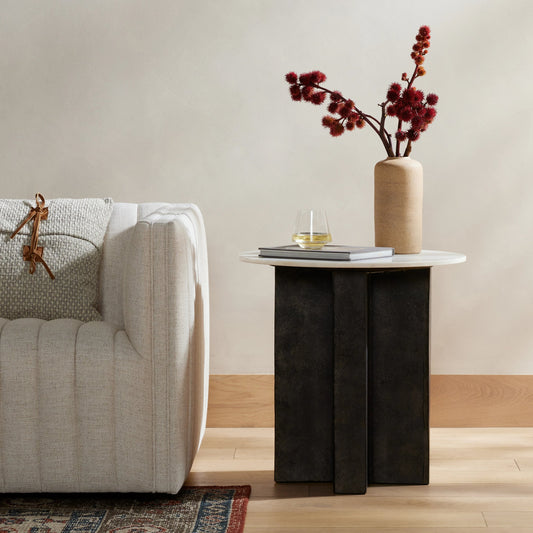 Terrell Round End Table by Four Hands in raw black, polished white marble. Made from solid marble, aluminum, engineered hardwood in a modern style.
