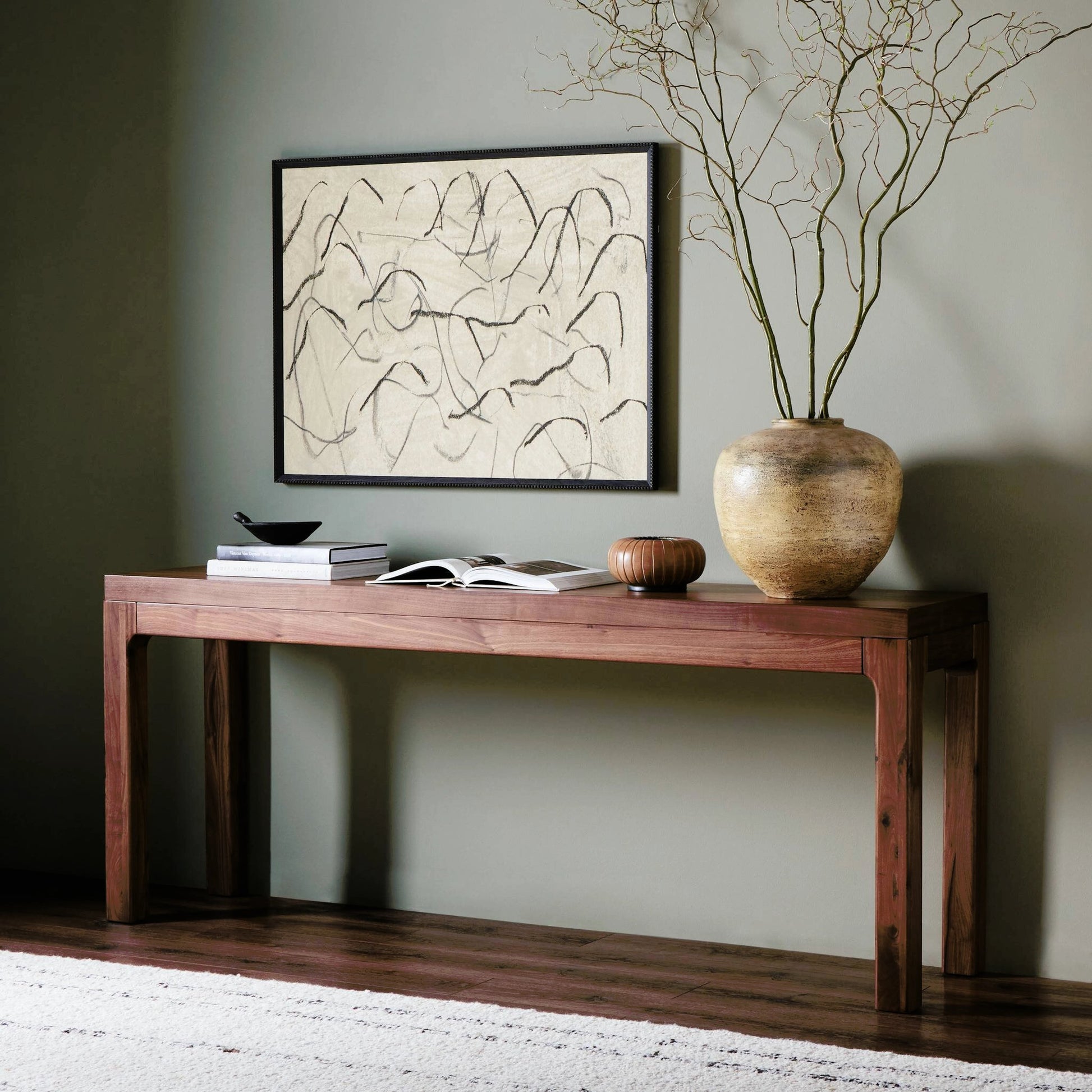 Arturo Console Table by Four Hands in natural walnut. Made from walnut veneer, solid walnut in a modern style.