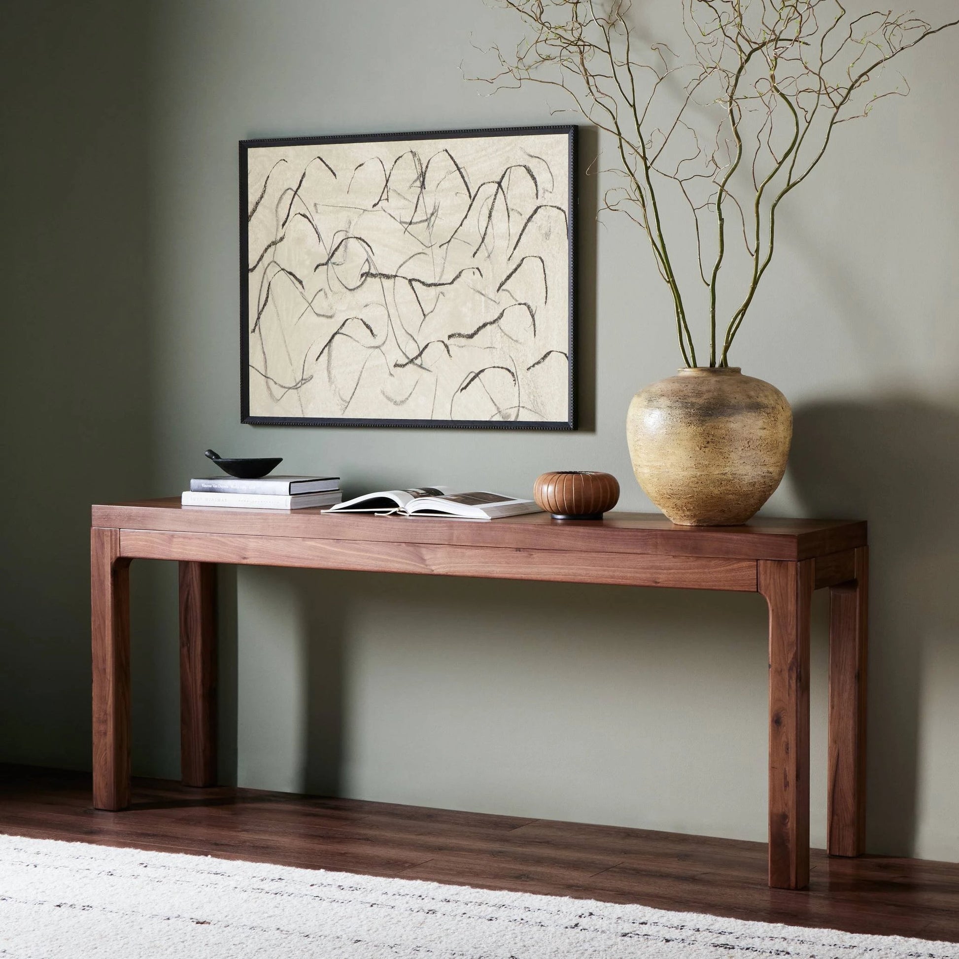 Arturo Console Table by Four Hands in natural walnut. Made from walnut veneer, solid walnut in a modern style.