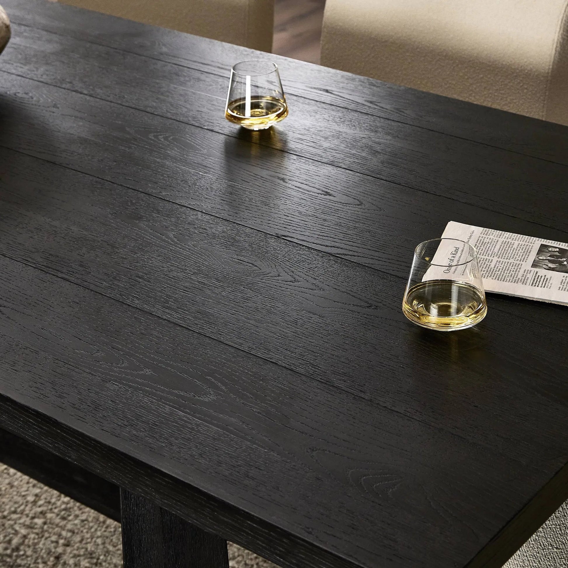 Munich Dining Table by Four Hands in ebony oak veneer, ebony oak thin veneer, ebony parawood. Made from thick oak veneer, solid parawood in a unique style.