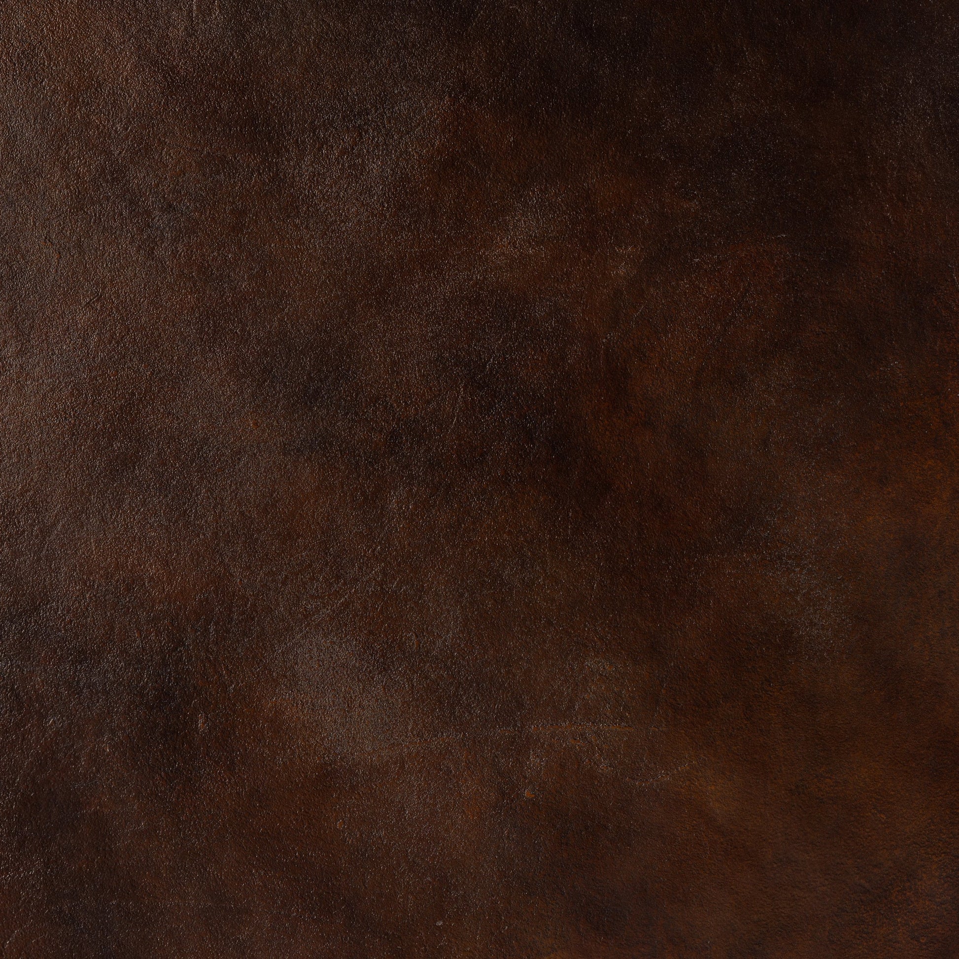 Searcy Coffee Table by Four Hands in antique rust. Made from aluminum in a modern style.