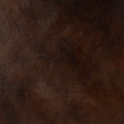 Searcy Coffee Table by Four Hands in antique rust. Made from aluminum in a modern style.