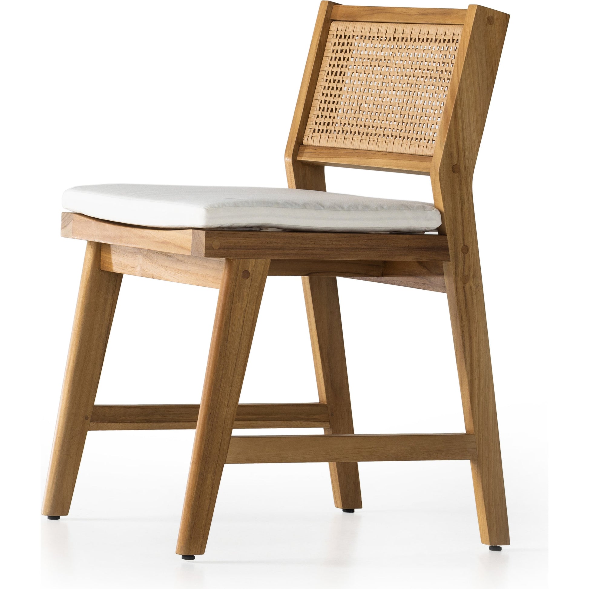 Merit Outdoor Dining Chair by Four Hands in faux rattan, natural teak. Made from solid fsc®-certified teak, 100% polyethylene in a transitional style.