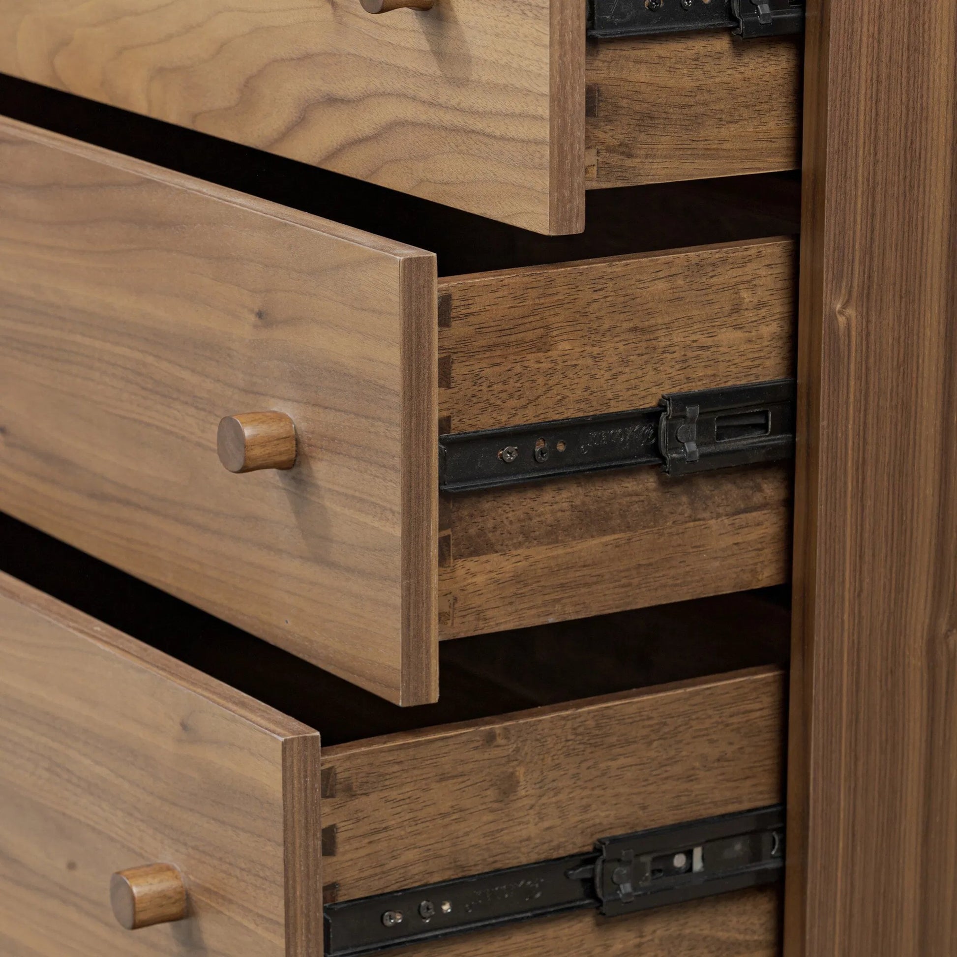 Arturo 9 Drawer Dresser by Four Hands in natural walnut veneer. Made from walnut veneer, solid walnut in a unique style.