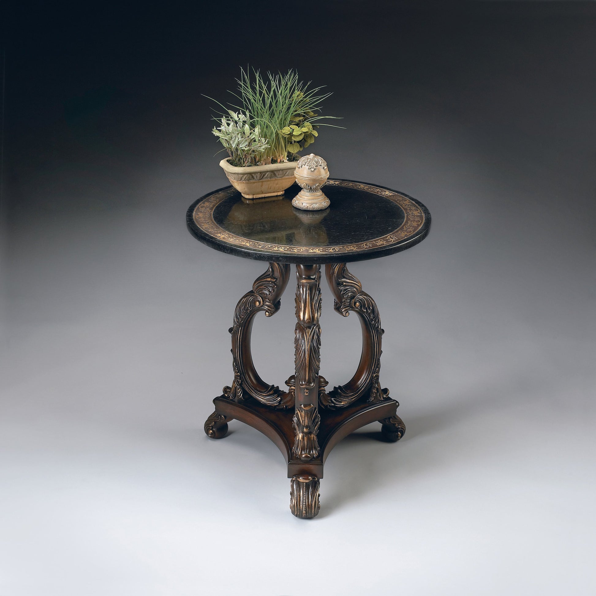 Bethany Accent Table by Butler Specialty Company in multi-color and heritage. Made from wood products, resin, black fossil stone, metal, brass in a traditional style.