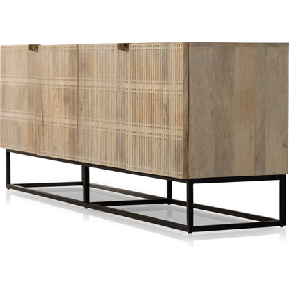 Kelby Closed Media Console by Four Hands in aged brass, carved vintage brown, vintage brown, gunmetal. Made from solid mango, iron in a modern style.