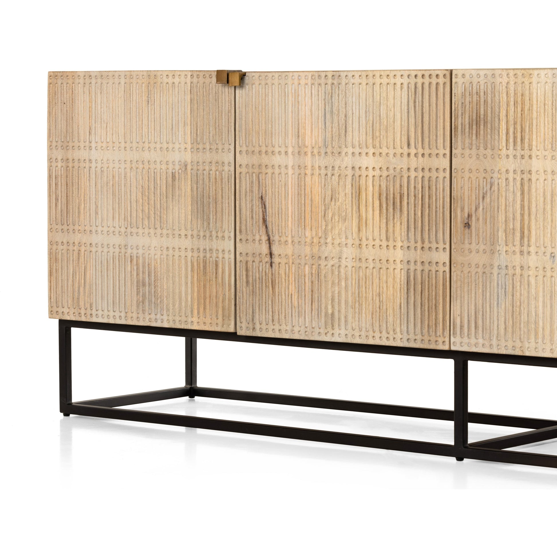 Kelby Closed Media Console by Four Hands in aged brass, carved vintage brown, vintage brown, gunmetal. Made from solid mango, iron in a modern style.