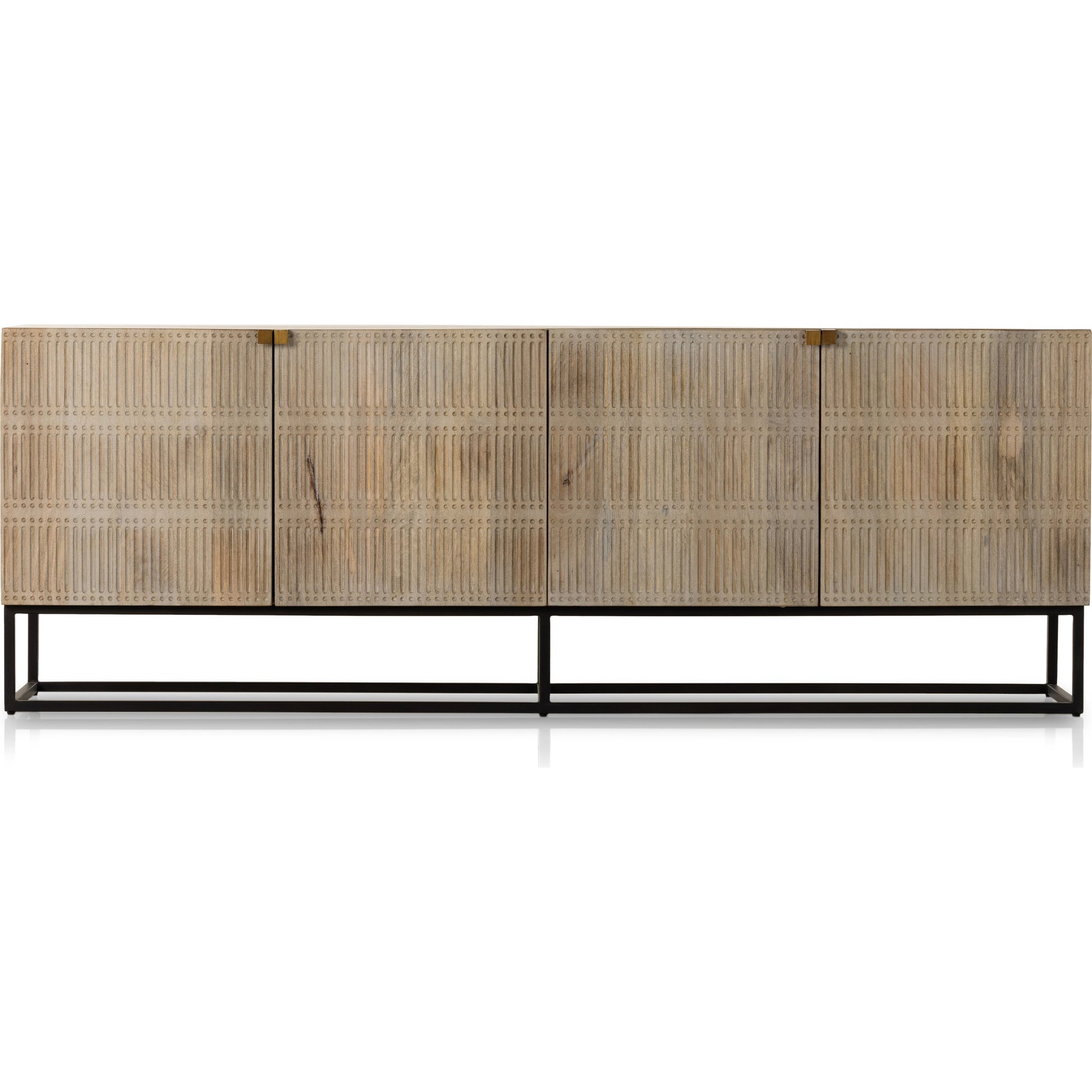 Kelby Closed Media Console by Four Hands in aged brass, carved vintage brown, vintage brown, gunmetal. Made from solid mango, iron in a modern style.