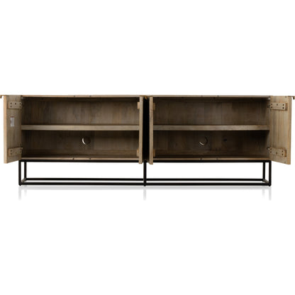 Kelby Closed Media Console by Four Hands in aged brass, carved vintage brown, vintage brown, gunmetal. Made from solid mango, iron in a modern style.
