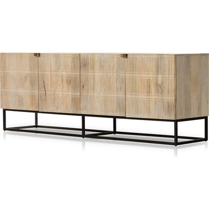 Kelby Closed Media Console by Four Hands in aged brass, carved vintage brown, vintage brown, gunmetal. Made from solid mango, iron in a modern style.