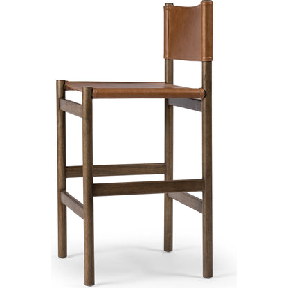 Kena Bar Stool by Four Hands. Made from solid parawood, top grain leather in a modern style.