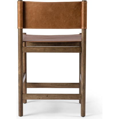 Kena Counter Stool by Four Hands. Made from solid parawood, top grain leather in a modern style.