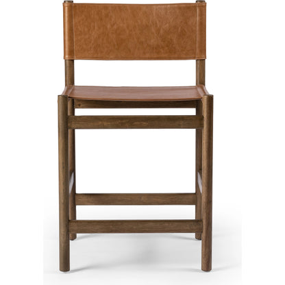 Kena Counter Stool by Four Hands. Made from solid parawood, top grain leather in a modern style.