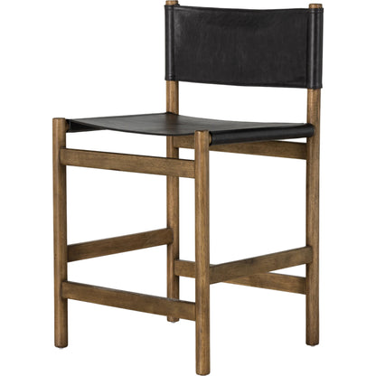 Kena Bar Stool by Four Hands. Made from solid parawood, top grain leather in a modern style.