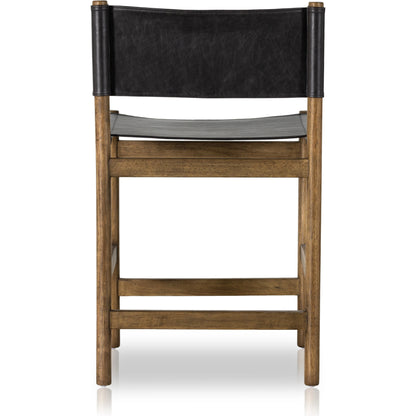 Kena Bar Stool by Four Hands. Made from solid parawood, top grain leather in a modern style.
