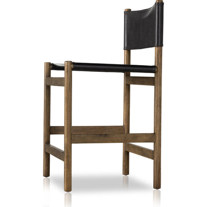 Kena Bar Stool by Four Hands. Made from solid parawood, top grain leather in a modern style.
