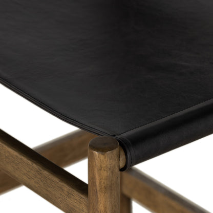 Kena Bar Stool by Four Hands. Made from solid parawood, top grain leather in a modern style.