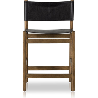 Kena Bar Stool by Four Hands. Made from solid parawood, top grain leather in a modern style.