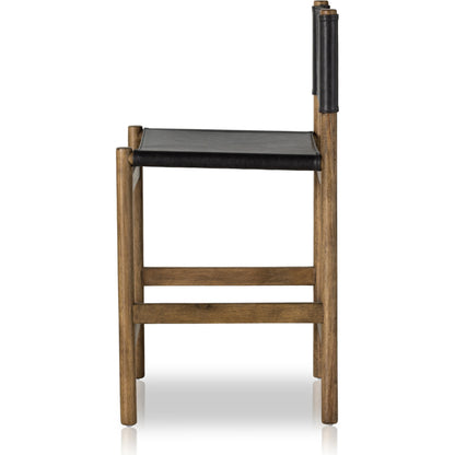 Kena Bar Stool by Four Hands. Made from solid parawood, top grain leather in a modern style.