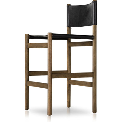 Kena Counter Stool by Four Hands. Made from solid parawood, top grain leather in a modern style.