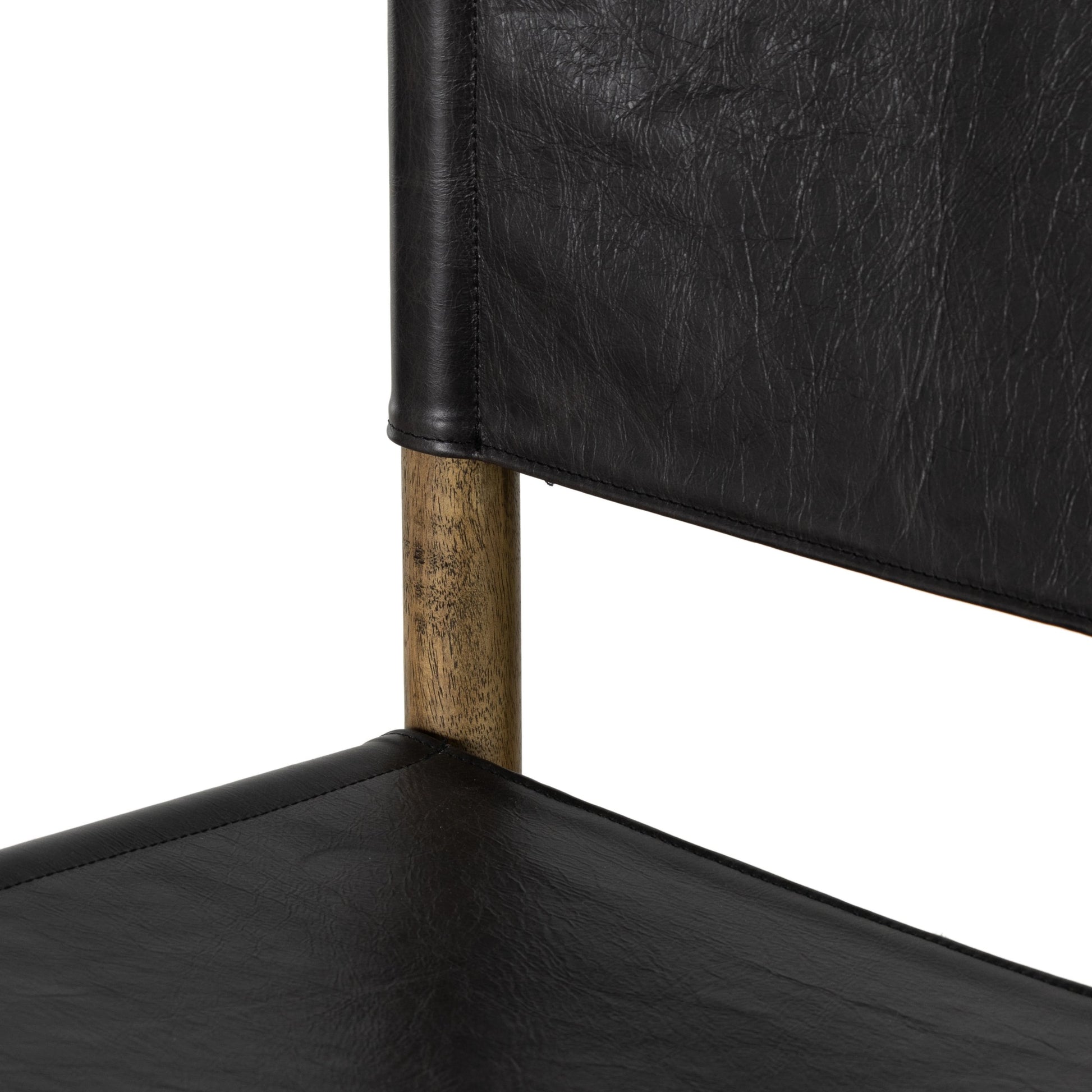 Kena Counter Stool by Four Hands. Made from solid parawood, top grain leather in a modern style.