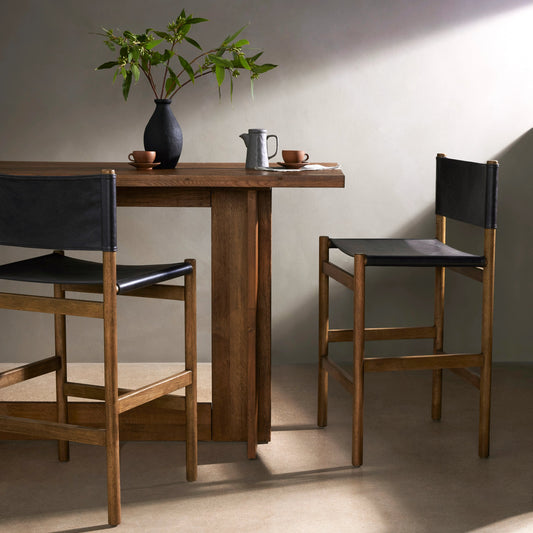 Kena Counter Stool by Four Hands. Made from solid parawood, top grain leather in a modern style.