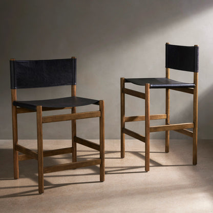 Kena Counter Stool by Four Hands. Made from solid parawood, top grain leather in a modern style.