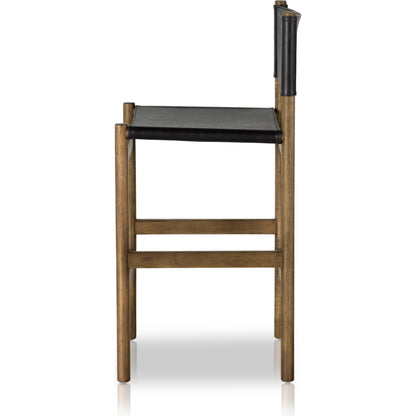Kena Counter Stool by Four Hands. Made from solid parawood, top grain leather in a modern style.