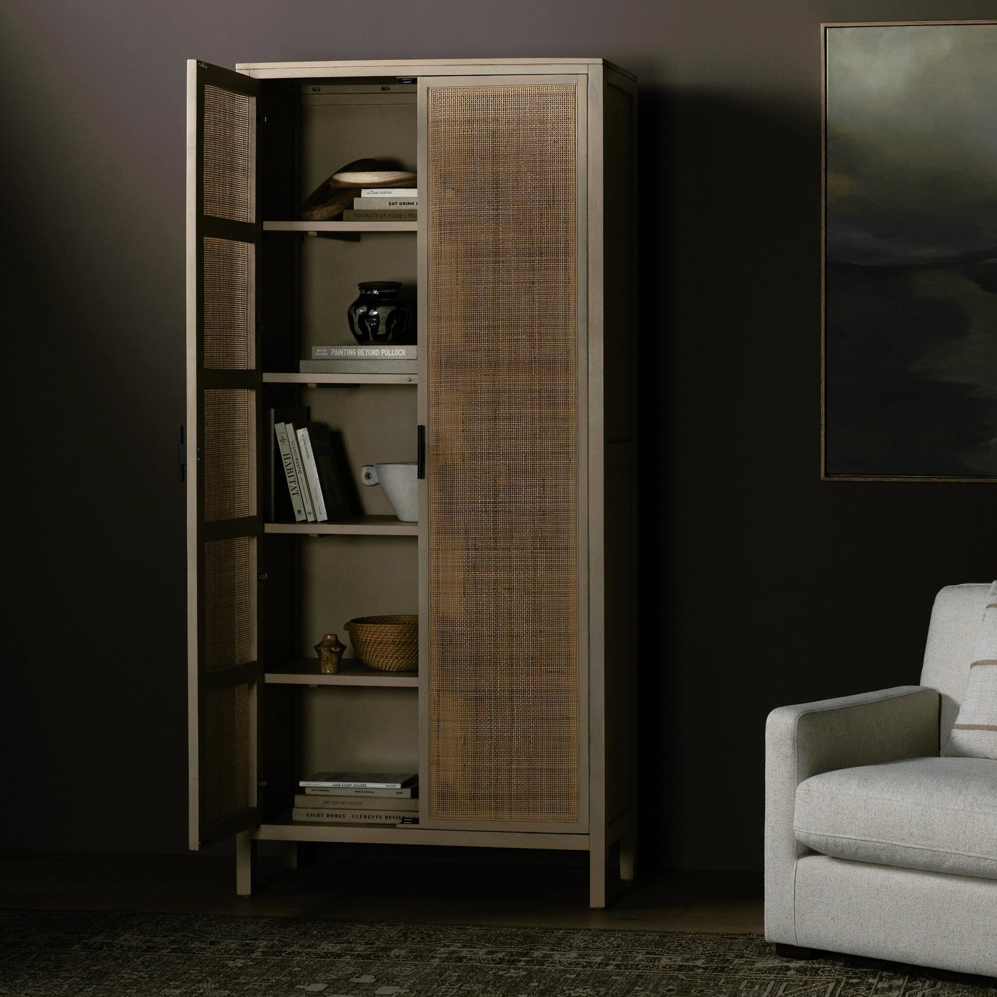Caprice Tall Cabinet by Four Hands. Made from cane, solid mango in a modern style.