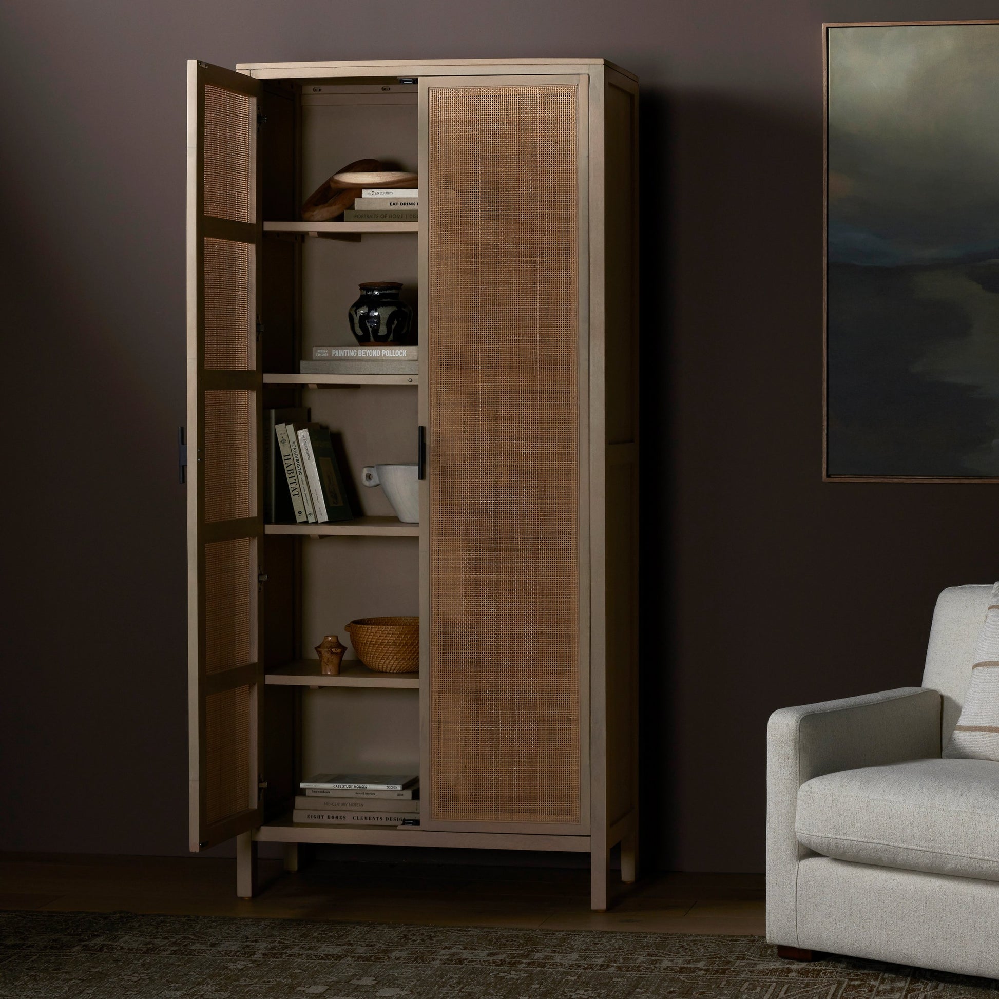 Caprice Tall Cabinet by Four Hands. Made from cane, solid mango in a modern style.