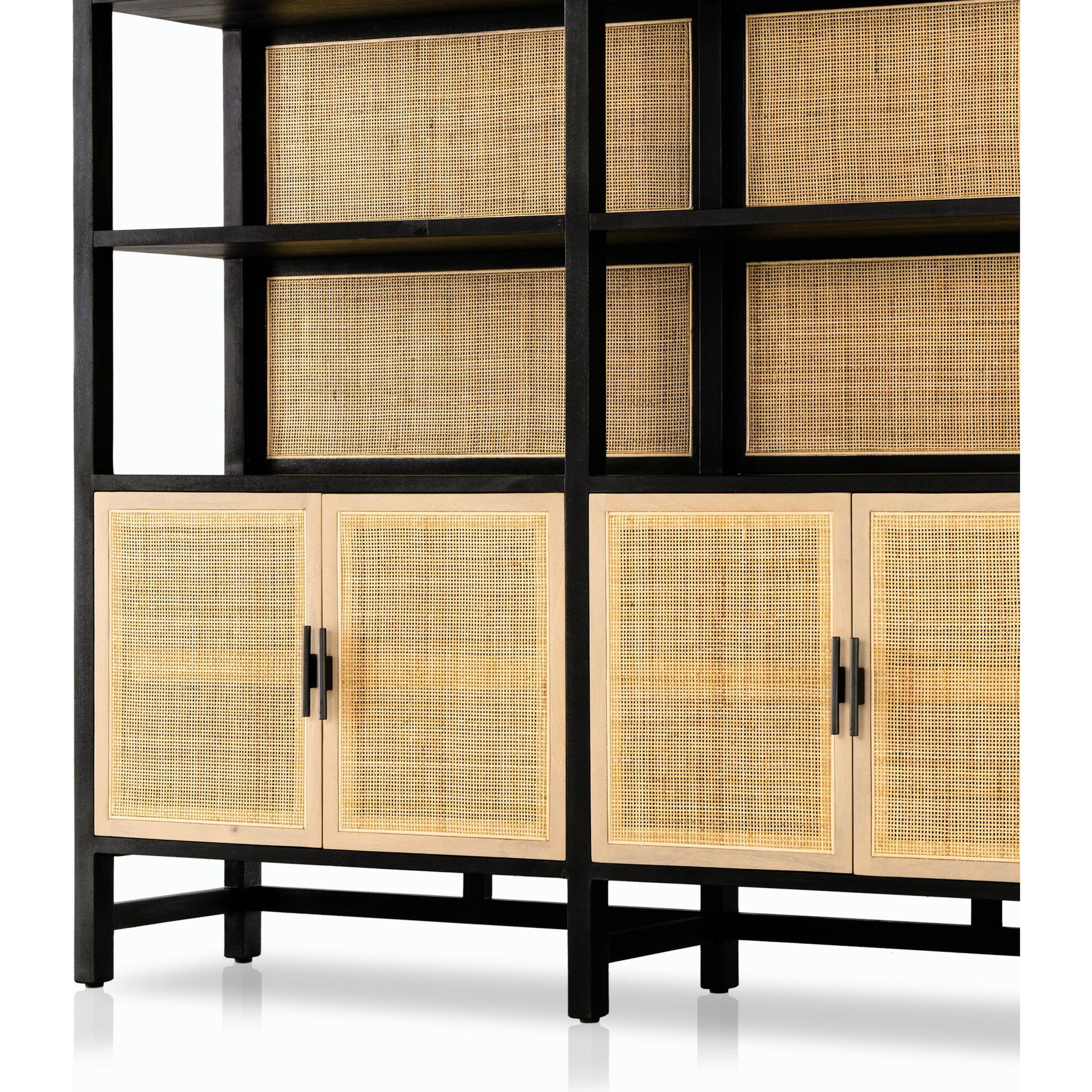 Caprice Wide Bookshelf by Four Hands in natural mango, gunmetal, natural cane and natural mango. Made from solid mango, iron in a modern style.